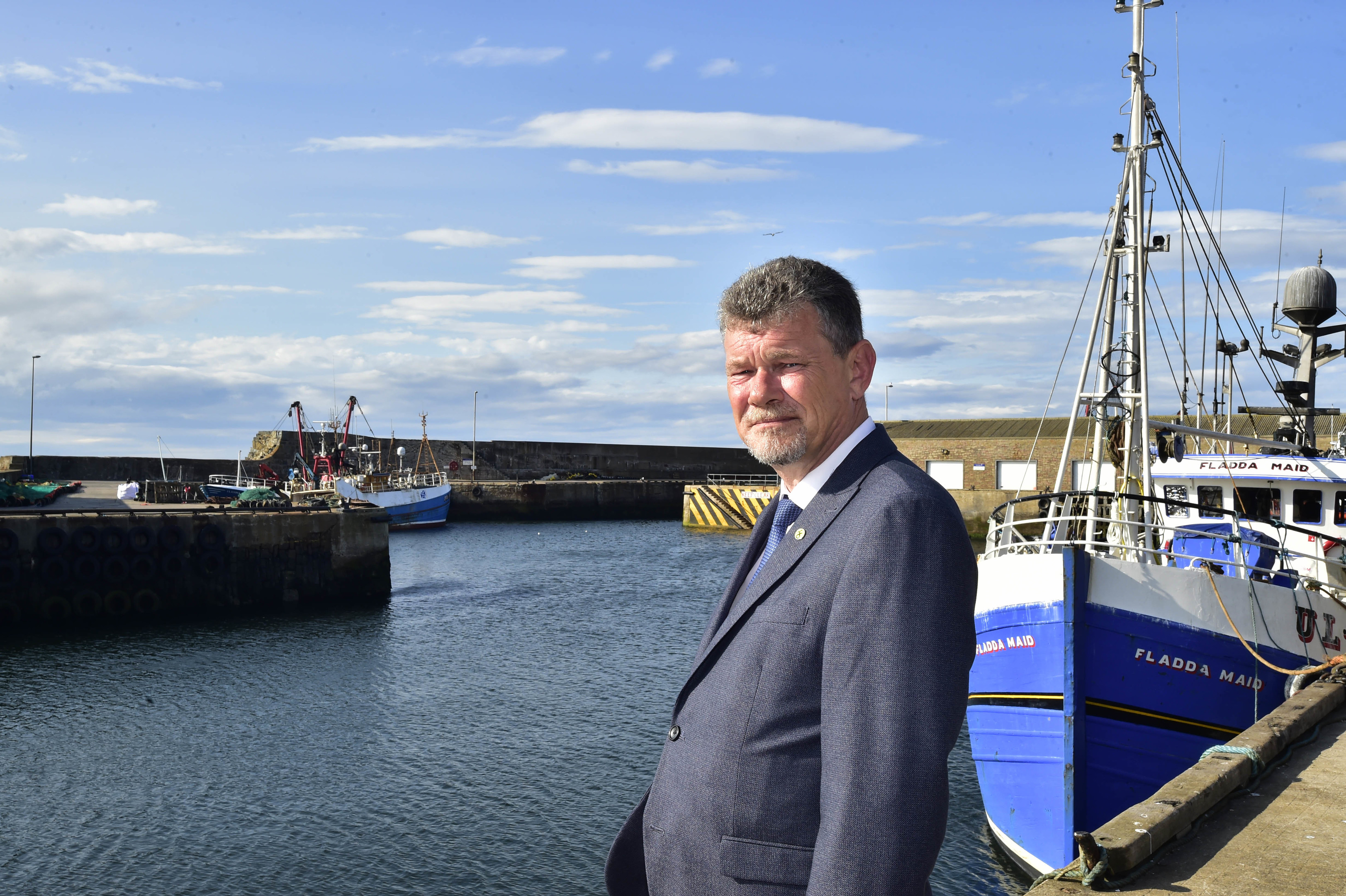 Councillor Ross Cassie at Macduff Harbour.