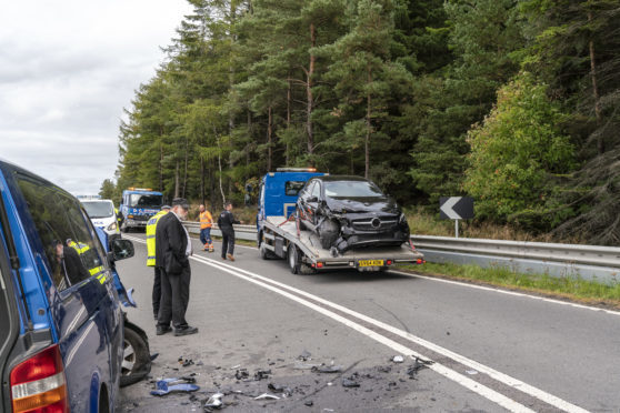 This is the scene of a RTC involving a Black Mercedes Car and a Blue VW Mini Bus on the A95 approx 1 mile west of the junction with the A96 at Keith. The Mercedes would have been travelling West and the VW Mini Bus would have been travelling East, returning to Keith, having dropped off all its School Pupils. The accident happened on a series of bends with distinct no overtaking centre lines.