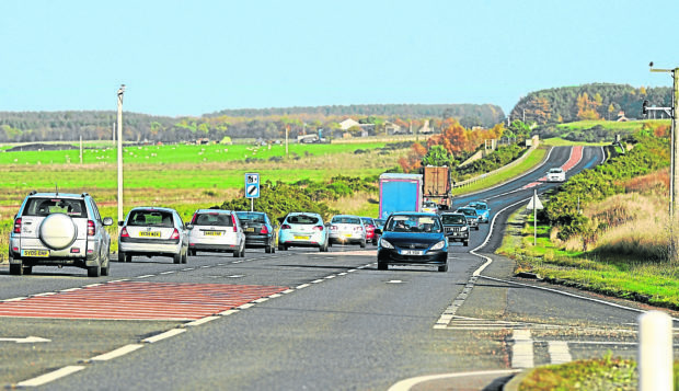 Emergency services were at the scene of a three vehicle crash last night, closing the A96 to fellow motorists.