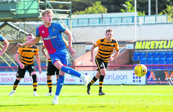 Inverness' Coll Donaldson misses from the spot.
