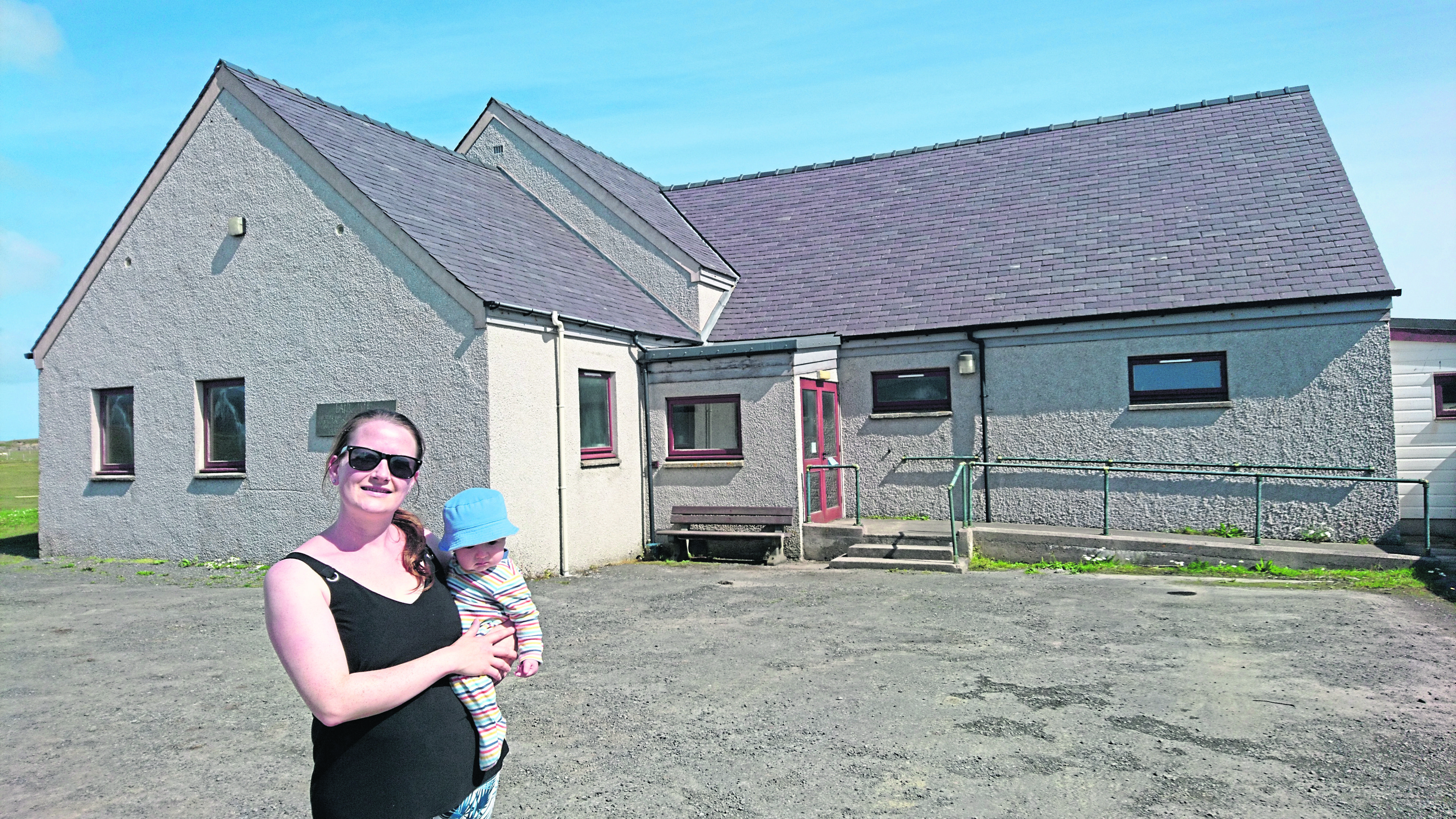 Fair Isle resident Eileen Thomson with son Ander, the youngest person on the island.
