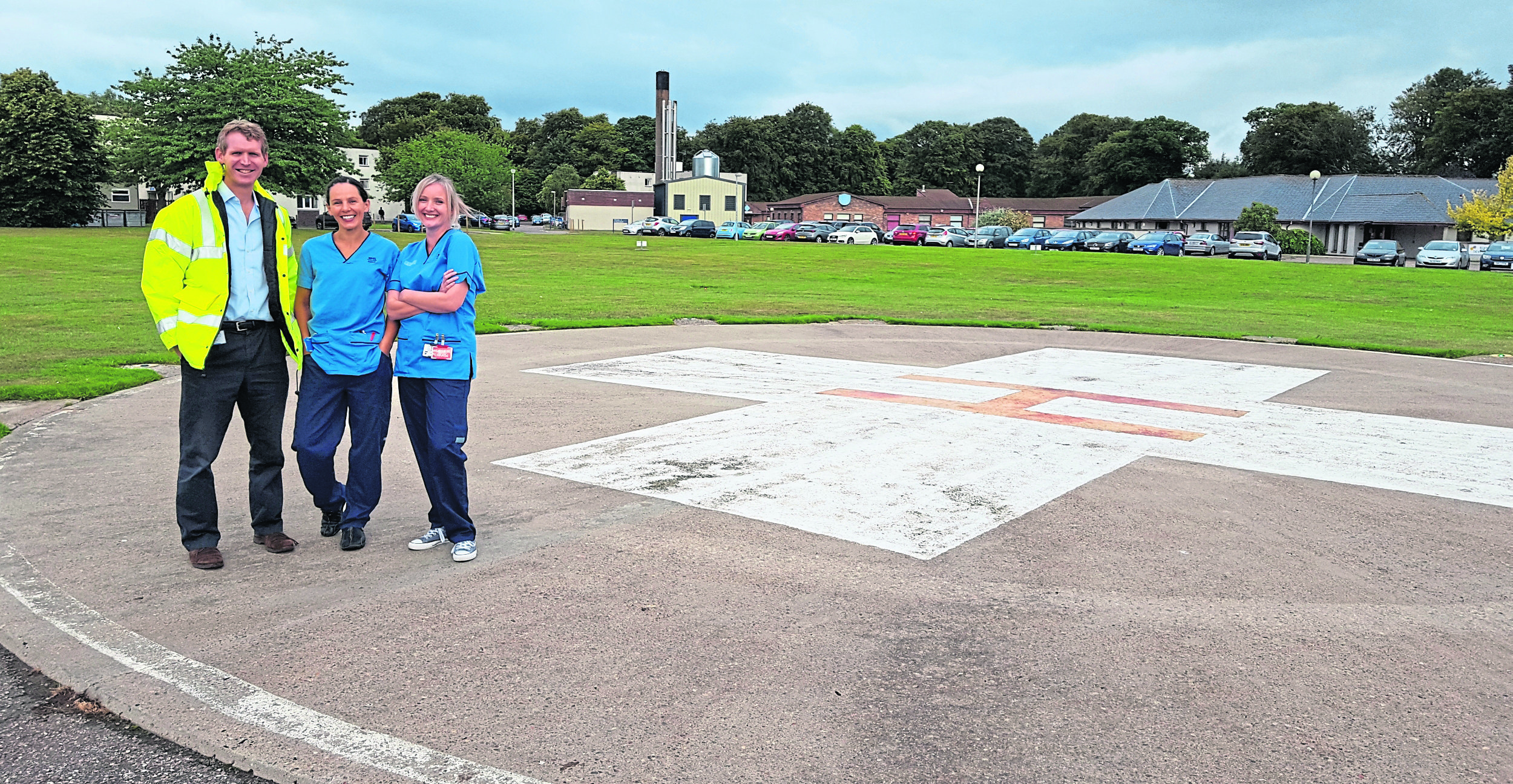 Dr Gary Kerr, consultant in emergency medicine, Sheila Van Lieshout, staff nurse and Jo MacCulloch, staff nurse at the helipad before the upgrade started.