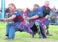 The Uncle Sam's Highlanders tug-of-war team takes part in the Mey Highland & Cultural Games at the John O'Groats Showground in Caithness. Teams representing Help for Heroes and the US Invictus Games team competed in an event described as a cross between a Highland Games and Invictus Games.