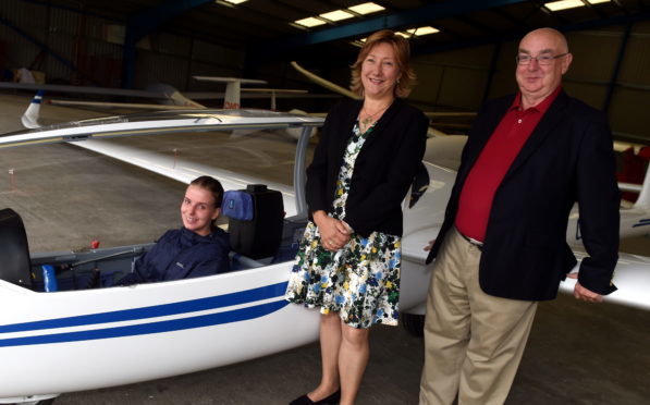 The Deeside Gliding club unveiled a new simulator at Aboyne. In the picture are from left: Maddy Draper, member, Claire Bruce, Visit Aberdeenshire and David Innes, committee member. (Picture by Jim Irvine)