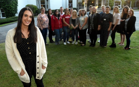 Miss founder Abi Clarke with the models taking part in a fashion show later this year. Picture by Jim Irvine