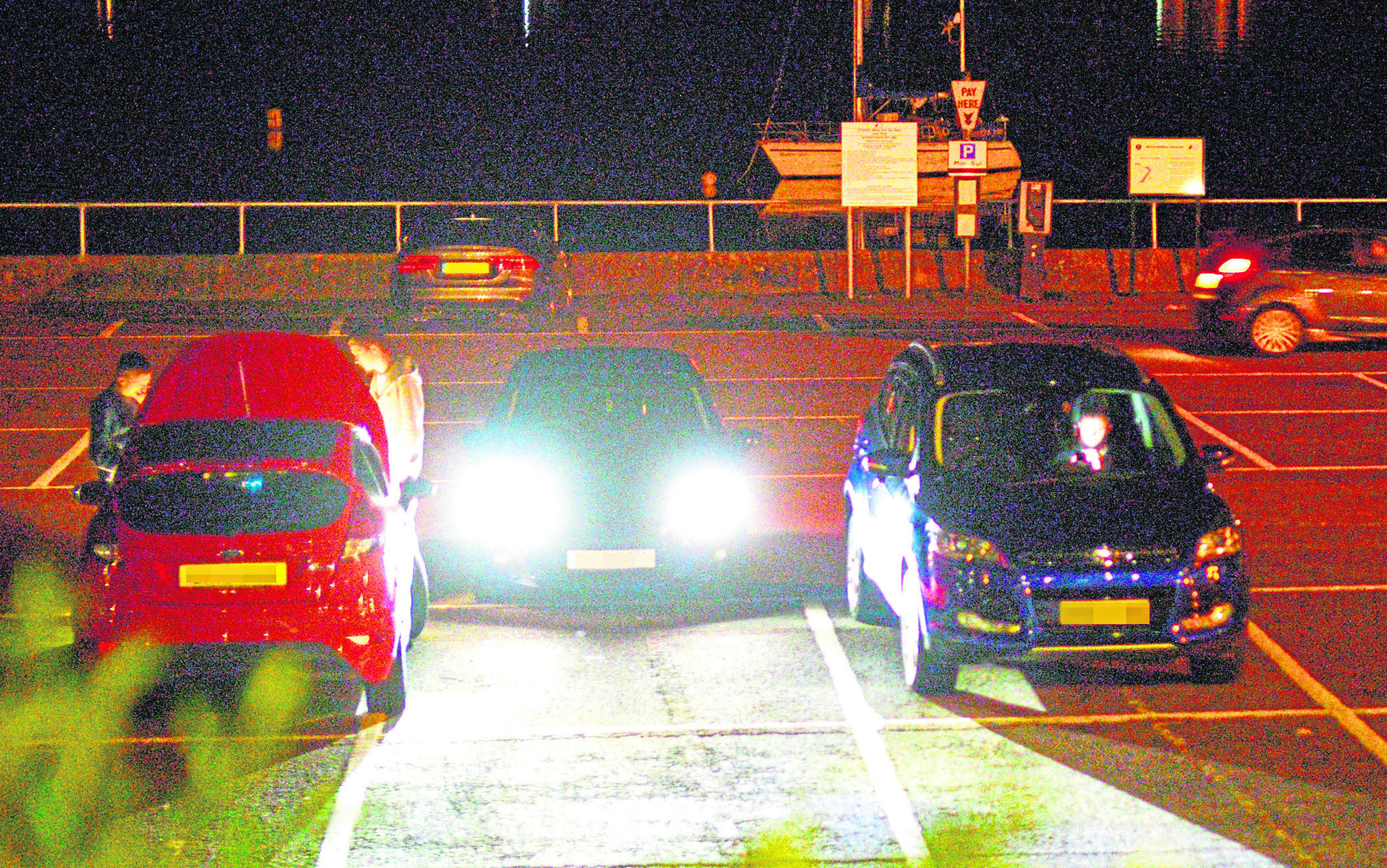 Cars gather in Fort Williams West End Car park.