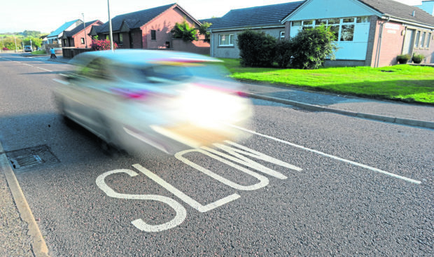 Old Edinburgh Road, Inverness, close to Hilton Primary School where speeding traffic is a concern.