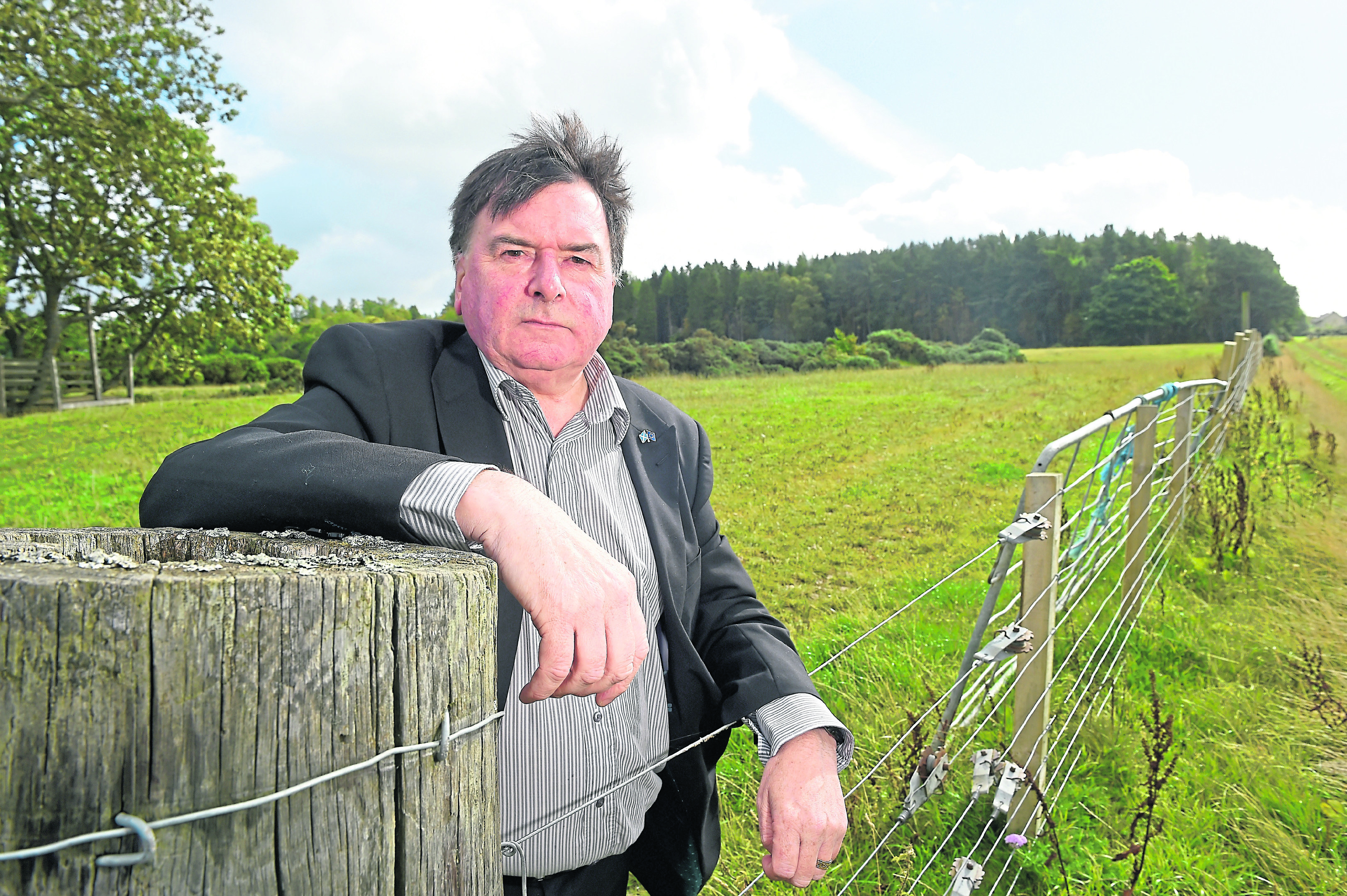 Councillor Ken Gowans in the Inshes area of Inverness where it is proposed to have over 500 timber lorry movements as Balvonie Wood is cut for timber.