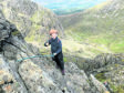 Marcus Tinley, 9, climbed the Tower Ridge. Photograph by SWNS