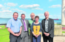The five original members of Aberdeen Renewable Energy Group, seen recently at Aberdeen beach, are David Roger, John Black, Jeremy Cresswell, Morag McCorkindale, and Iain Todd.