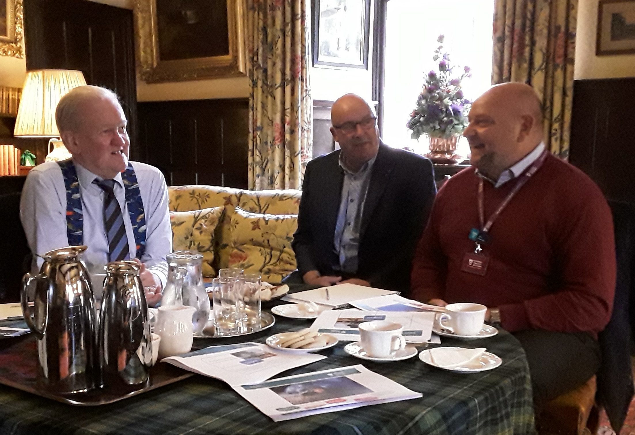 Lto R Stewart Stevenson MSP; Cllr Alastair Forsyth; and Ian Hawkins talking about the Trusts strategy