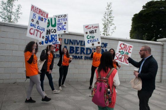 Nightclub staff protesting at Aberdeen University.
