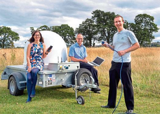 L-R: Andrea McColl, of HIEs life sciences team, with Pathfinder Accelerator participant Gavin MacFie, of Kazbeg, and Richard Allan, of External Reality, with his prototype mobile satellite equipment.
HIE Mobile Broadband
Andrea McColl HIE( Life Sciences)
and Gavin MacFie from Kazbeg Ltd take advantage of Remote Broadband Satellite service provided by Richard Allan from External Reality 
 

Pic Trevor Martin