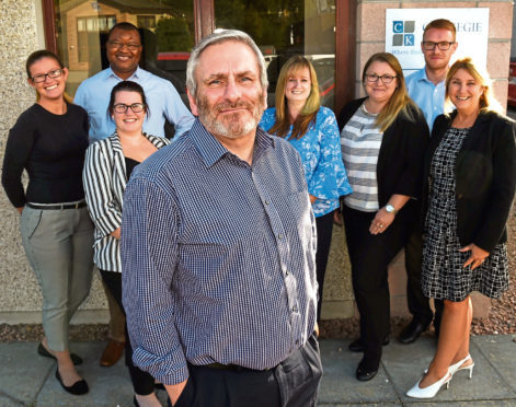 Small business profile: Alan MacPherson at Carnegie Knox, Blackburn. In the picture are from left: Lisa Frisken, Jane Annand, Kevin Okpewo, Alan MacPherson, Lesley Taylor, Iwona Beaton, Chris Durno and Lorraine Simpson. 
Picture by Jim Irvine  5-9-18