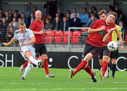 Picture of Niall Docherty having a shot at goals. Picture by Kenny Elrick.