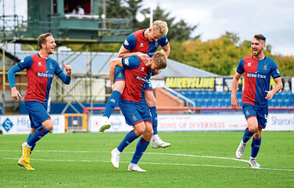 15/09/18 LADBROKES CHAMPIONSHIP
 INVERNESS V PARTICK THISTLE (3-2)
 CALEDONIAN STADIUM - INVERNESS
 Inverness defender Shaun Rooney (right) celebrates his goal.