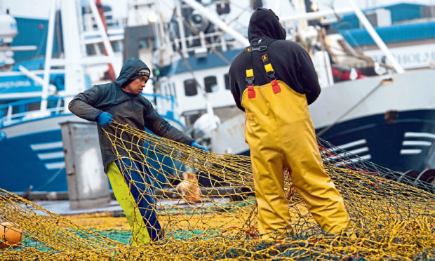 Fishermen at Peterhead harbour. Local crews will be watching the trade negotiations with keen interest.