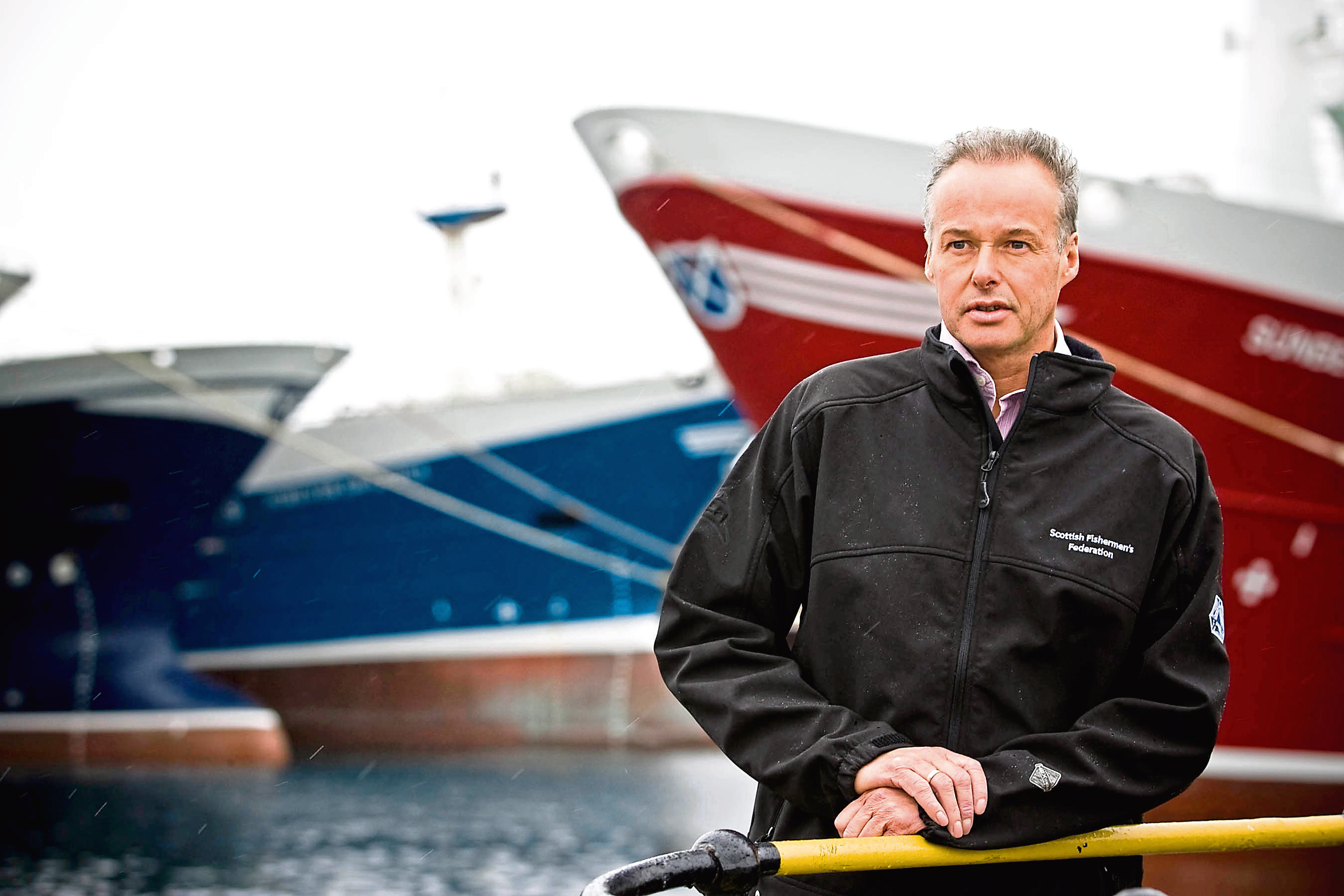 MEETING OF THE SKIPPERS OF SCOTLANDS PELAGIC FLEET IN FRASERBURGH. 

PIC OF IAN GATT CHIEF EXECUTIVE OF THE SPFA, AT FRASERBURGH HARBOUR WITH PELAGIC FISHING BOATS.

PIC BY LEX BALLANTYNE / NEWSLINE SCOTLAND