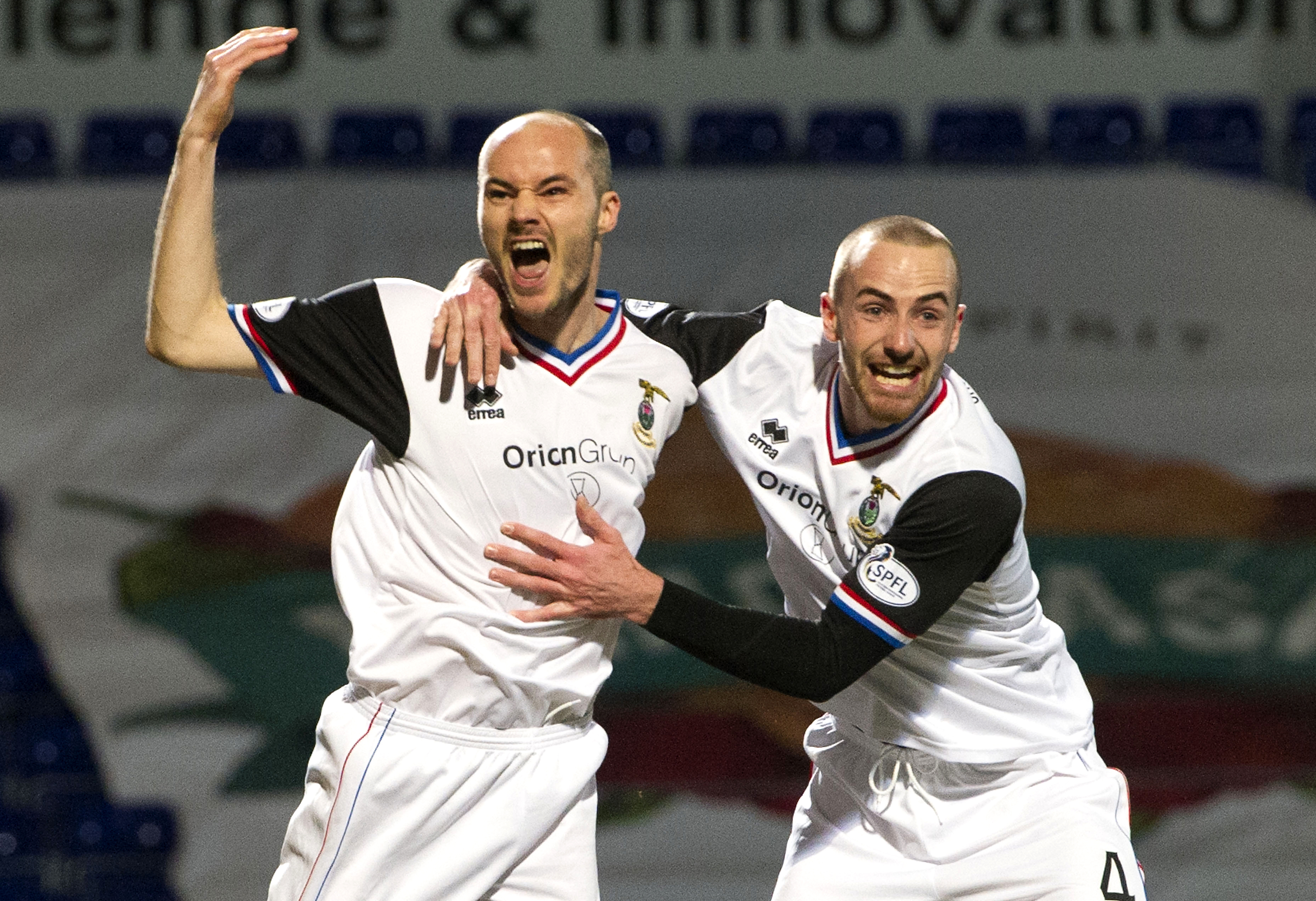 David Raven celebrates his goal with James Vincent in February 2014.