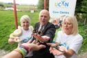 Aberdeen Lord Provost Barney Crocket faced his fear of tarantulas with Wynford Farm Park's Jenny Neil and Ucan manager Gayle Stephen. Picture by Norman Adam / Aberdeen City Council