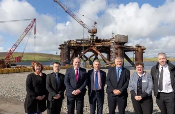 Paul Wheelhouse, third from left, visits Dales Voe with staff from the Oil and Gas Authority, Lerwick Port Authority, HIE, and Peterson