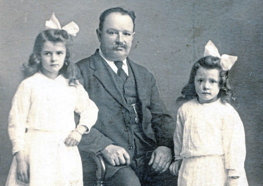 David Tulloch, Charles Wilson and granddaughters