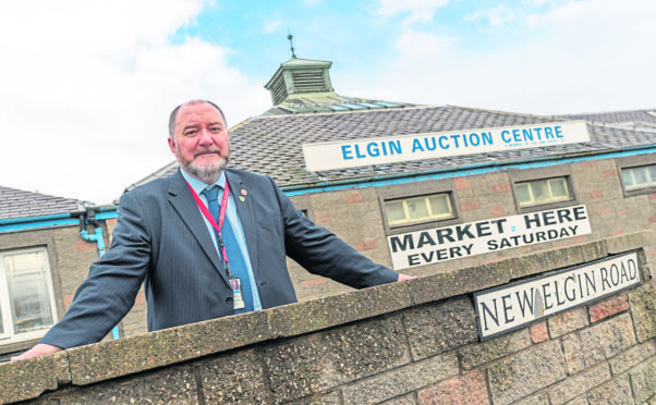 Councillor John Divers outside Elgin Auction Centre.