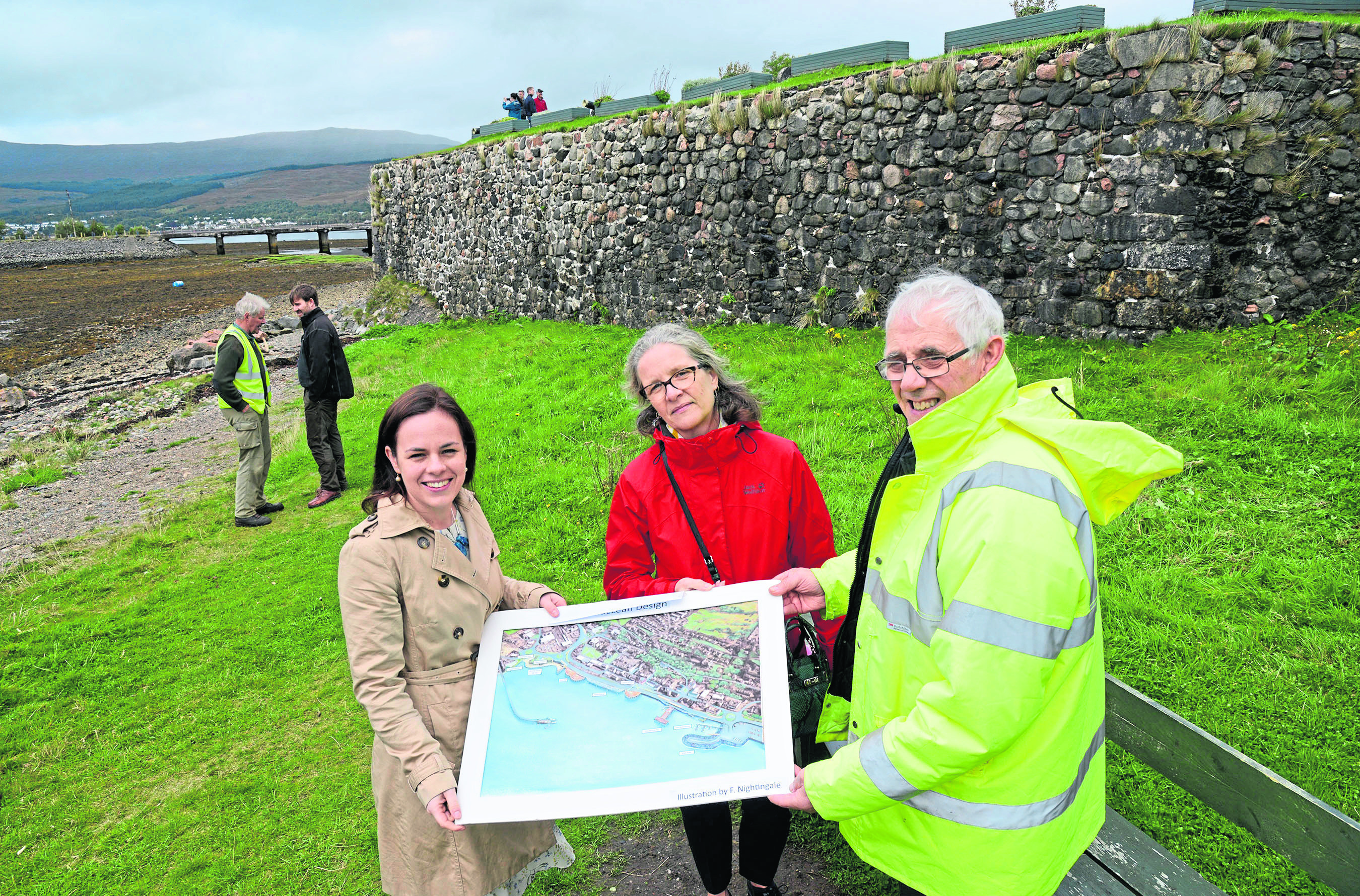 Norrie MacLean discusses plans for the remains of the historical military base with Barbara Cummins and Kate Forbes.