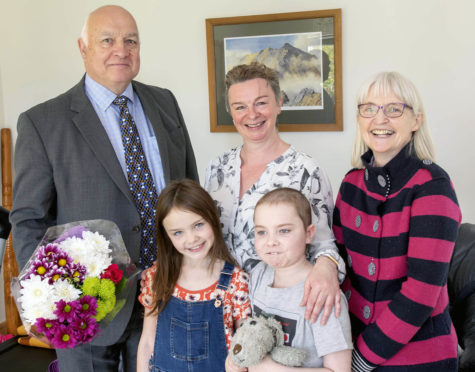 Councillor Bill Lobban with Lorna Cottam, Councillor Muriel Cockburn and front Della and Tavish.