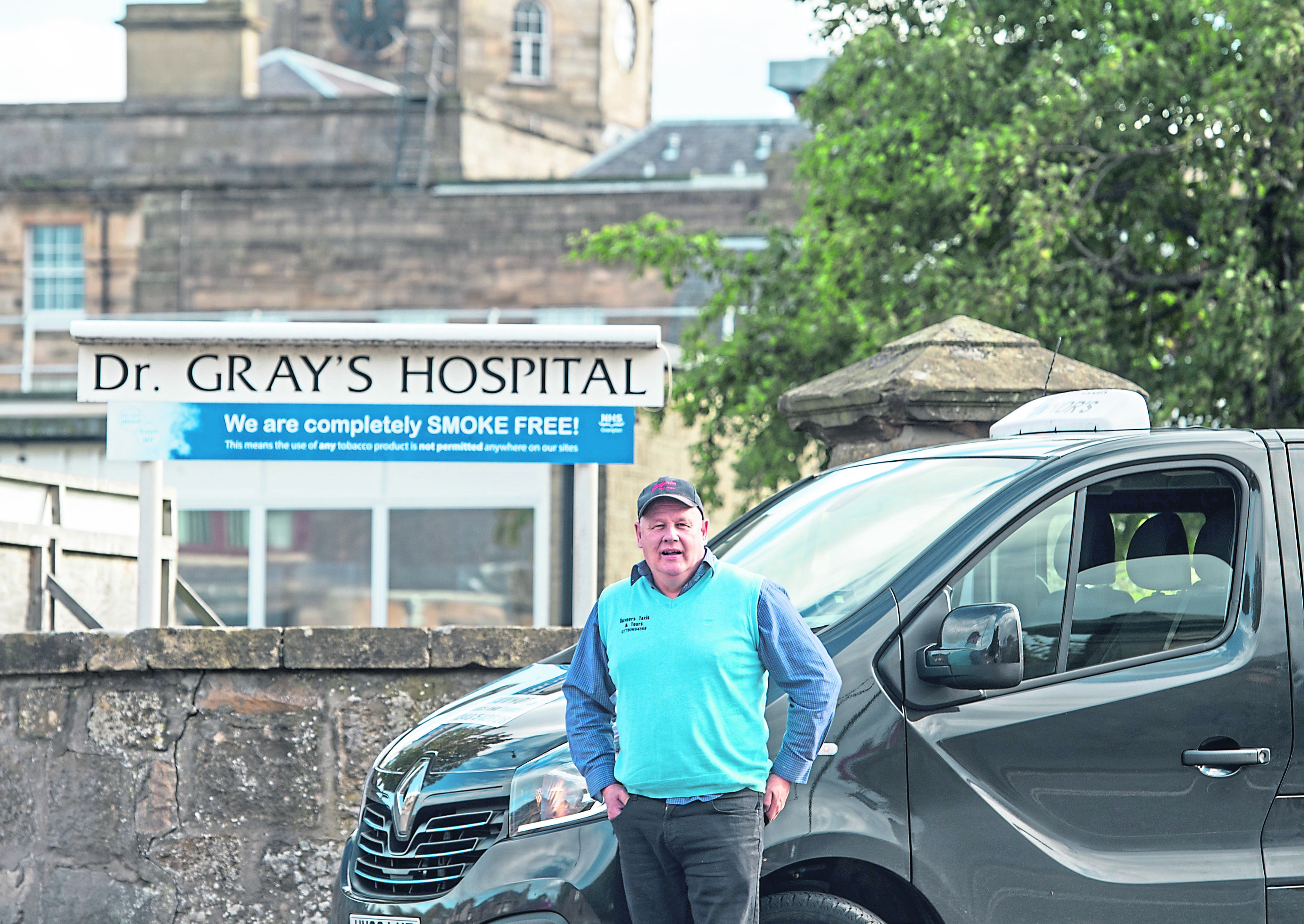 Taxi man Garey Stewart outside of Dr. Grays Hospital in Elgin.