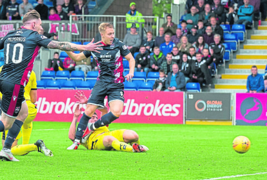 Ross County's Jamie Lindsay scores against Falkirk.