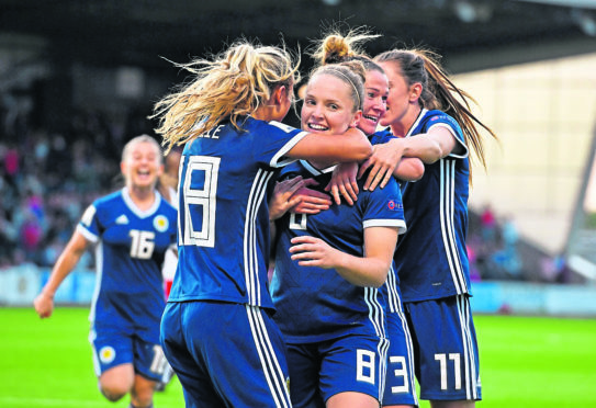 Scotland celebrate a Kim Little goal.