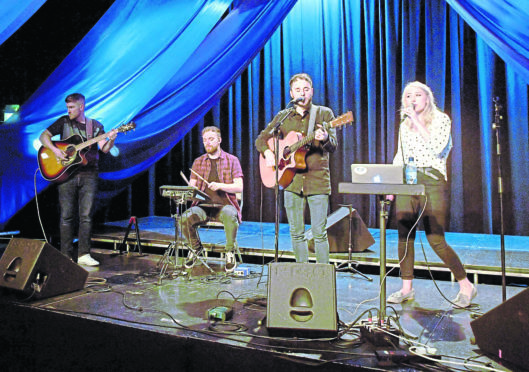 The Harmonica Movement performing for My First Gig at the Lemon Tree.