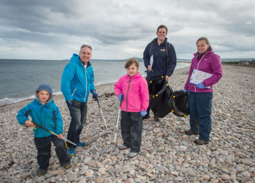 Picture: L to R - Ewan Moxon (volunteer) Richard Lochhead Ellie Moxon, Calum Brown (Head of Conservation Scotland at Marine Conservation Society and mum Alicia Moxon.