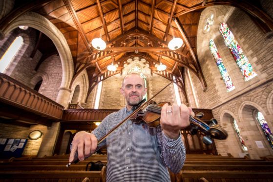 Picture by JASON HEDGES

To celebrate the opening of the 3rd Findhorn Bay Concert, Pictures show Duncan Chisolm in rehearsals at St Laurence Church in Forres.