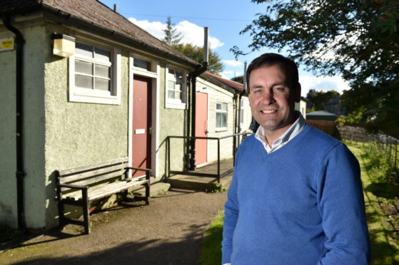 Pastor Barry Douglas and  the Old building services depot on School Road, Aberdeen.