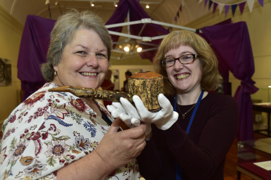 Councillor Anne Stirling (left) and Fiona Slattery Clark, museums development co-ordinator examine a pipe that was made and smoked by Queen Victoria's servant John Brown at Balmoral.