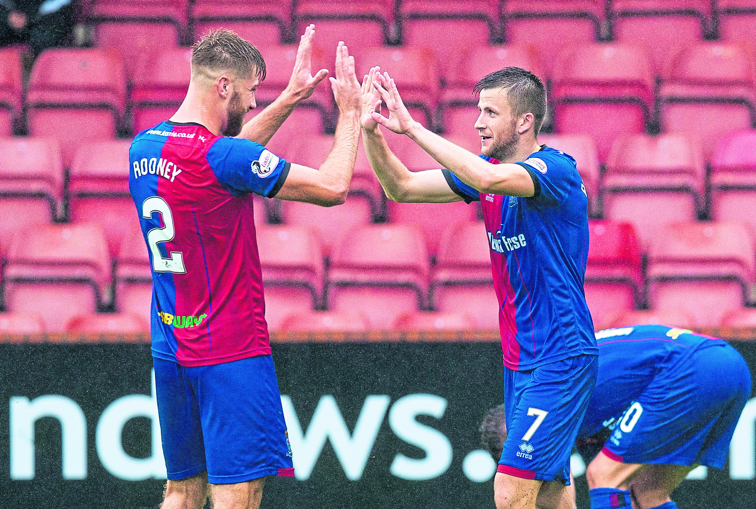Inverness CT's Liam Polworth scores to double the lead for his side.