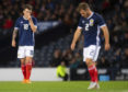 Ryan Jack (left) and Ryan Fraser reflect on Scotland's 4-0 defeat.
