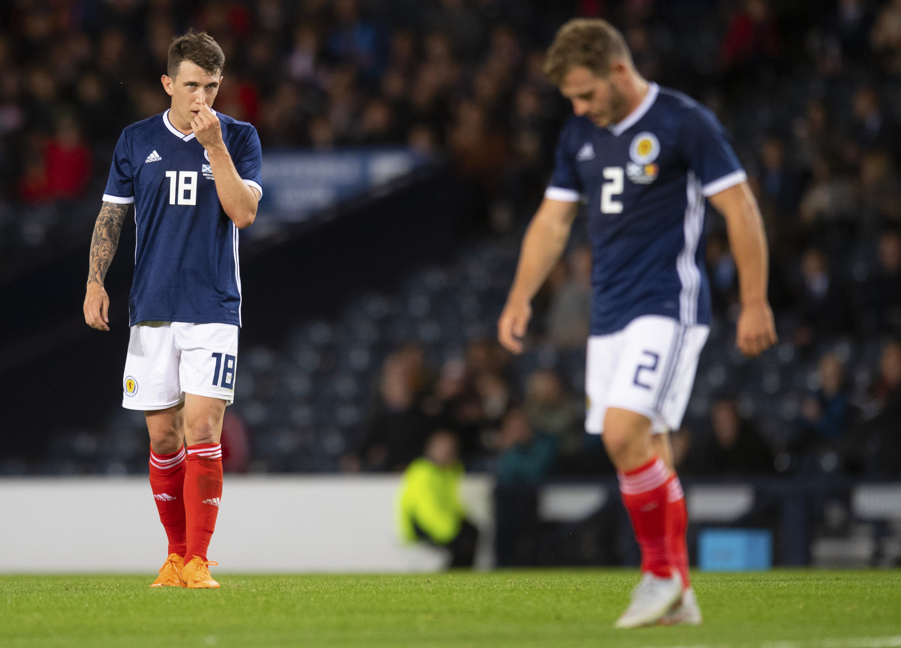 Ryan Jack (left) and Ryan Fraser reflect on Scotland's 4-0 defeat.