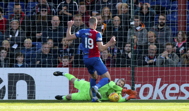 Scott Fox denies Jordan White in the weekend's Highland derby.