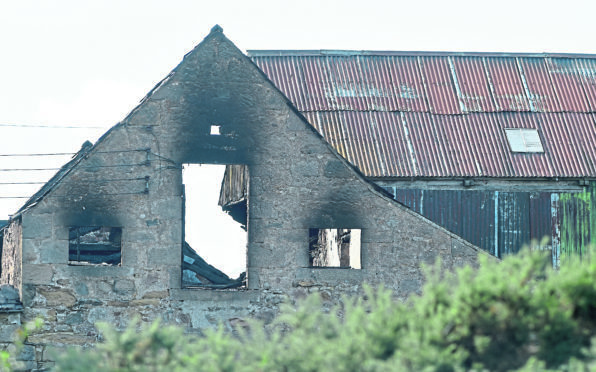 The burnt out remains of St Vincent farm in Tain.