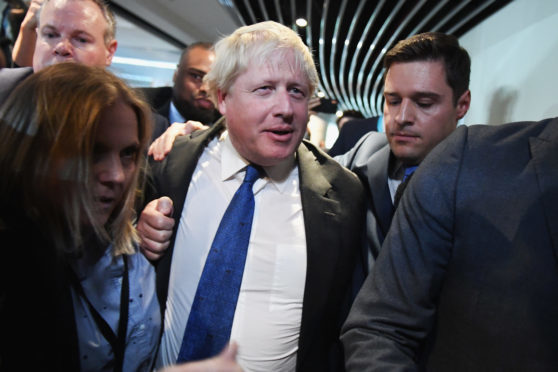 Ross Thomson acts as "bodyguard" for Boris Johnson