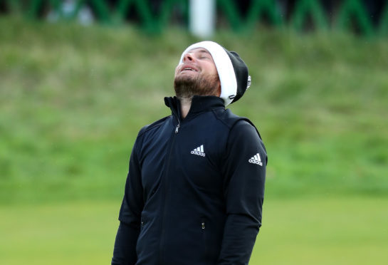 Tyrell Hatton reacts to his missed putt on the 18th