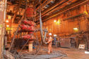 Pic is of an offshore worker on Apache North Sea's Forties Charlie platform. Black gold.