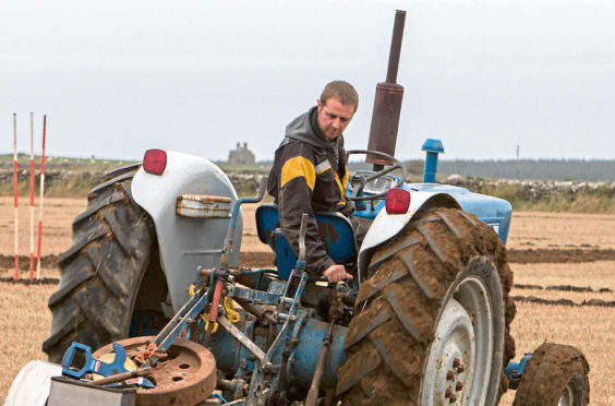 Graeme Mackay, Buldoo, Dounreay, won the open and county championship, along with an armfull of other trophies. He was using a Ford 4000 tractor and Ransomes plough.
