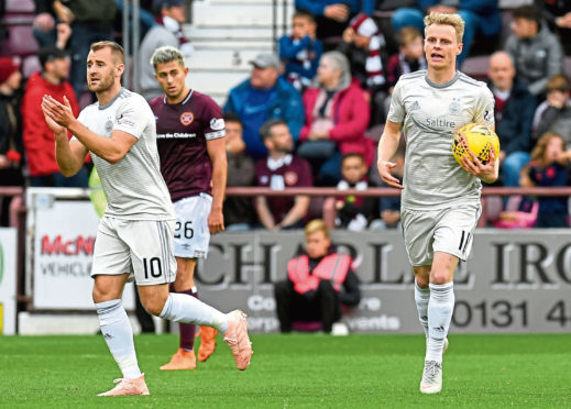 Aberdeen's Gary Mackay-Steven (right) celebrates scoring at Tynecastle in the 2018/19 Dons change kit. Image: SNS.