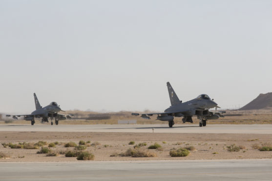 Pictured are Typhoons from RAF Lossiemouths II (Army Cooperation) Squadron arriving at Thumrait Airbase.