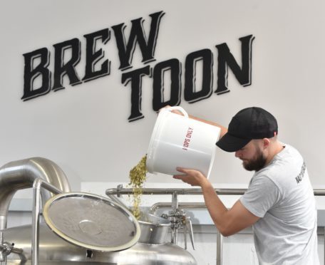 Man working at Brew Toon.