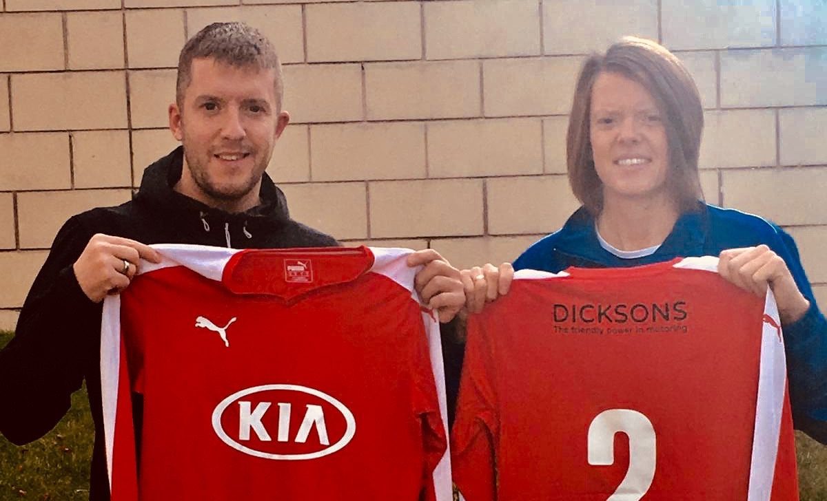 Keith Mason from Dicksons of Inverness Kia and Karen Mason, Manager of Inverness City Ladies FC, as new kit is handed over to the city side.